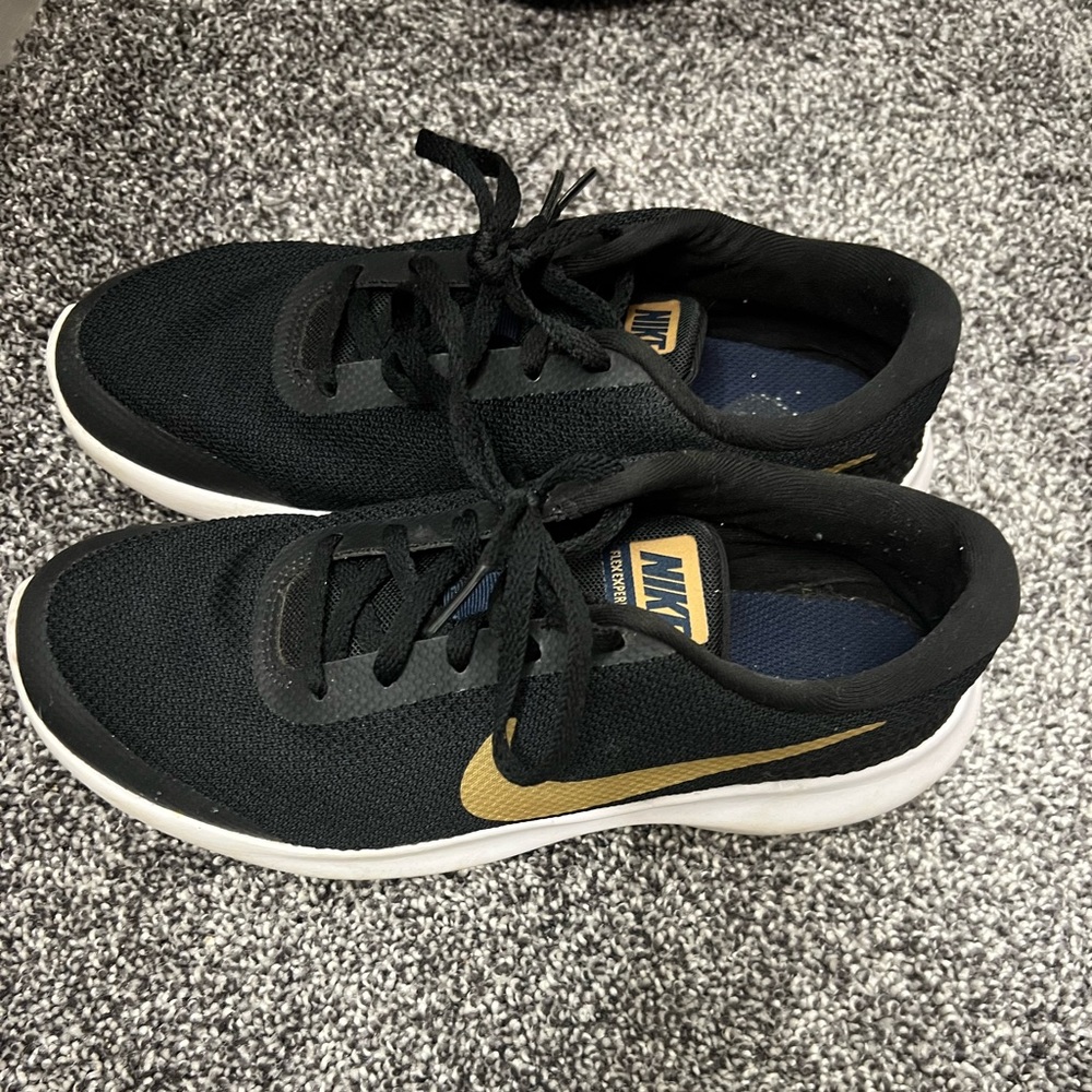 Black and Gold Nikes size 7